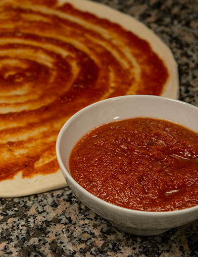 Tomatsaus til italiensk pizza